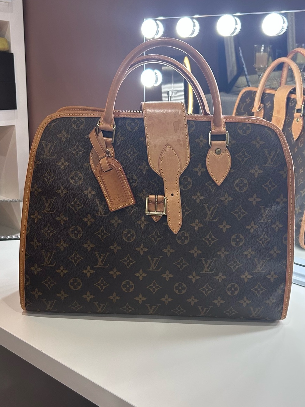 Louis Vuitton Rivoli Business Bag in Monogram Canvas and Vachetta Leather